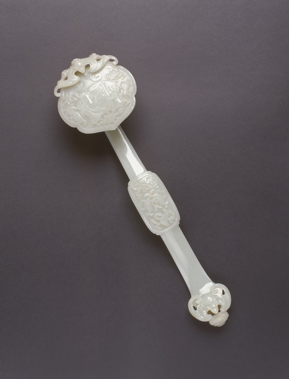 Ruyi sceptre (celadon stone) by Chinese School