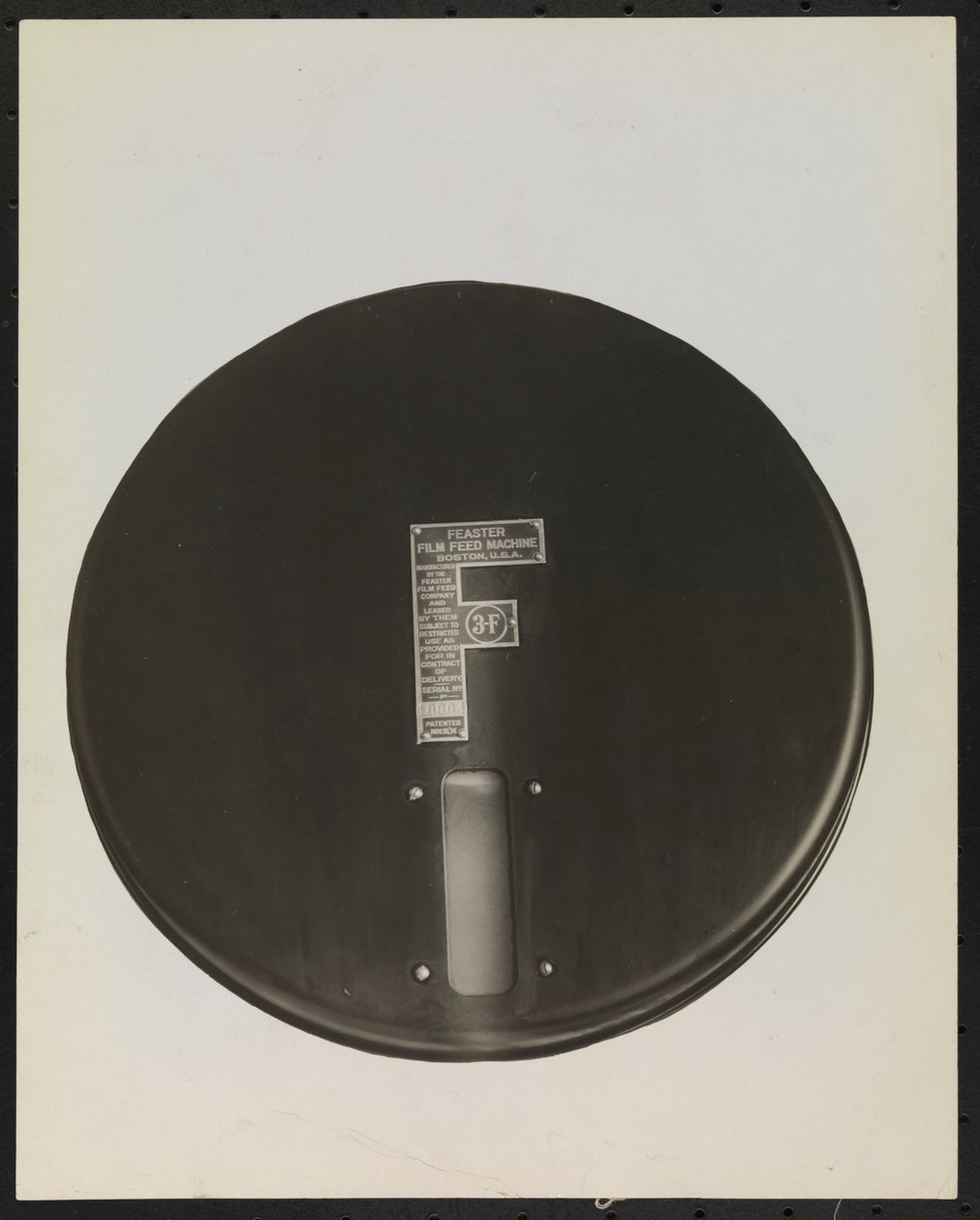 Feaster Film Feed Machine for phonograph records, cut-out or masked to produce a blank background by Company Byron