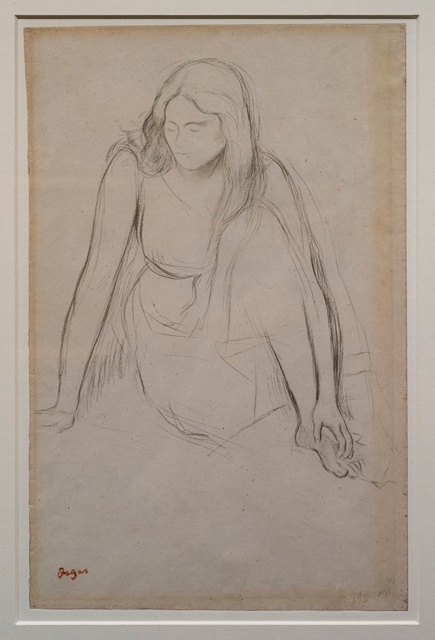 Woman Sitting at the Water