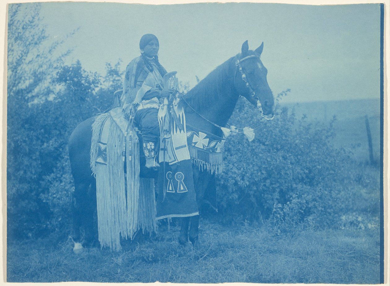 Cayuse Woman on Horseback by Edward S. Curtis