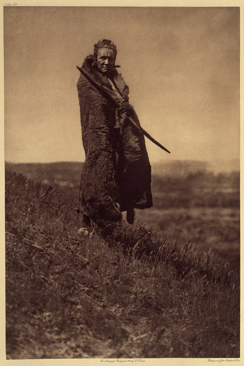 A Grizzly-Bear Brave, Piegan by Edward Sheriff Curtis