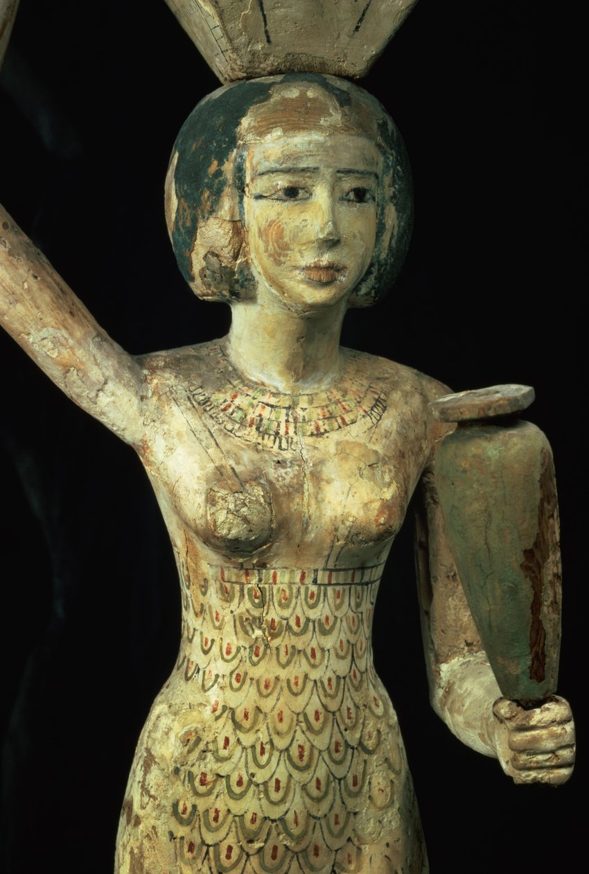 Female bearer of offerings carrying a water vase in her hand and a vessel on her head, Egyptian, Middle Kingdom, c.1950 BC (detail) by Egyptian 12th Dynasty