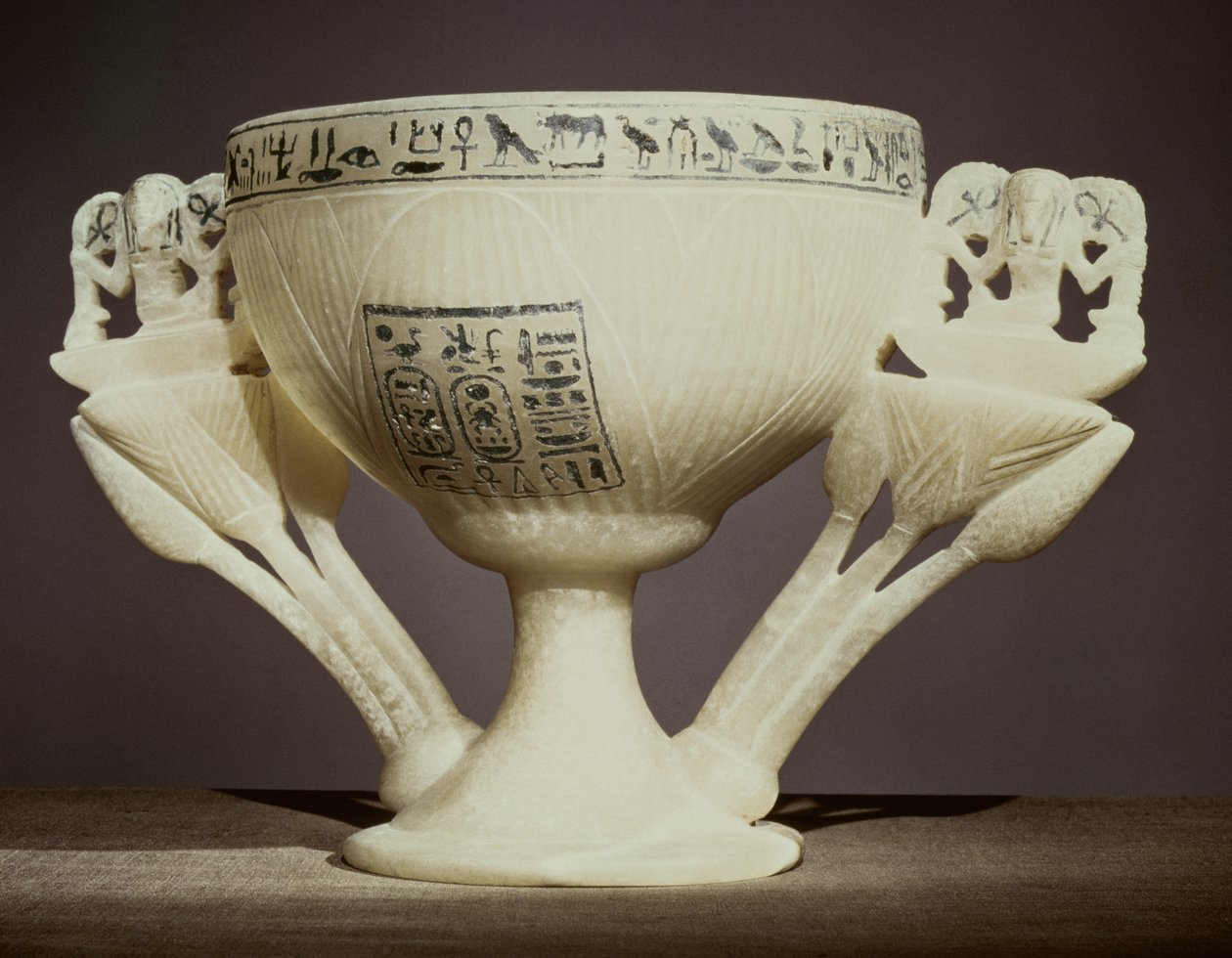 Drinking cup in the form of a half-opened lotus flower, found at the entrance to the tomb of Tutankhamun by Egyptian 18th Dynasty