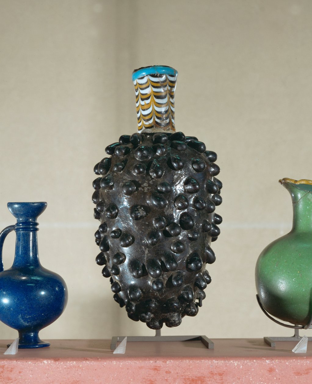 Flask made by immersing a matrix in molten glass by Egyptian 18th Dynasty