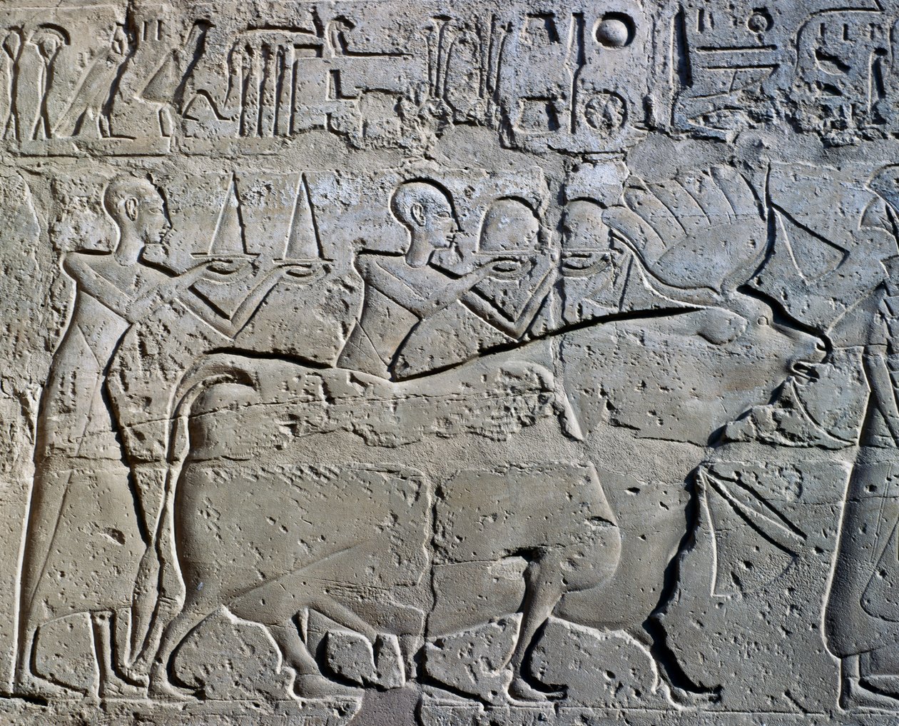 Characters symbolizing mining districts bringing their tributes to god by Egyptian 19th Dynasty