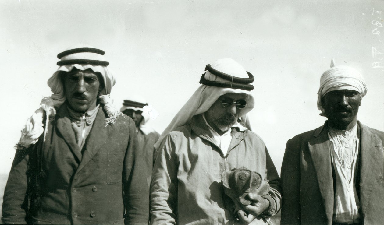 Garstang (holding chalice) and two members of the excavation team by English Photographer