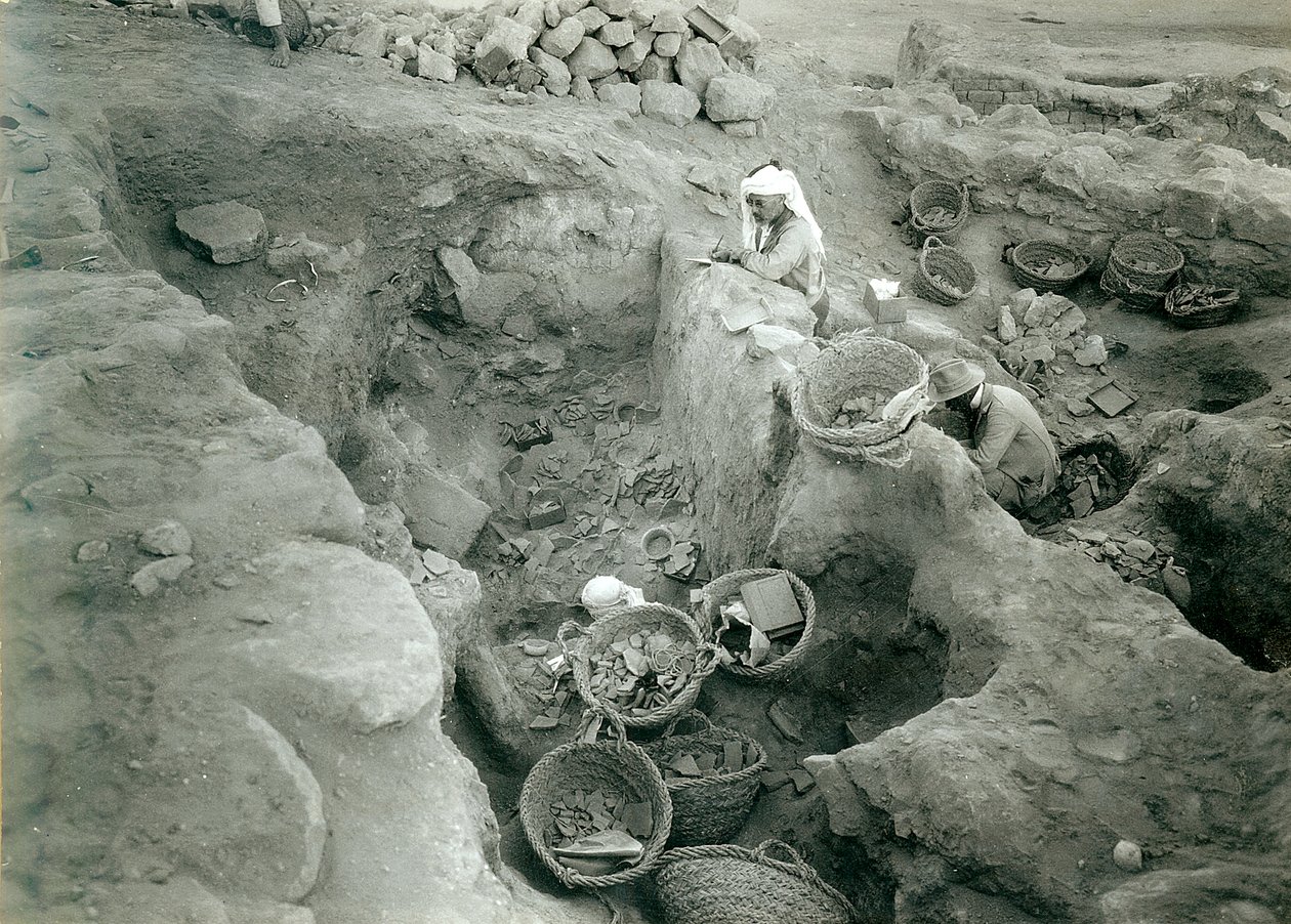 Garstang recording excavated Middle Bronze Age (2000-1500 BC) store rooms by English Photographer