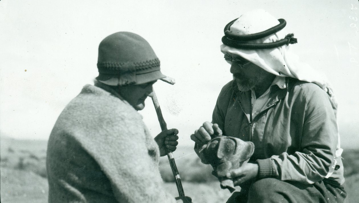 John Garstang showing a piece of Yahudieh Ware pottery chalice to Mrs Garstang by English Photographer