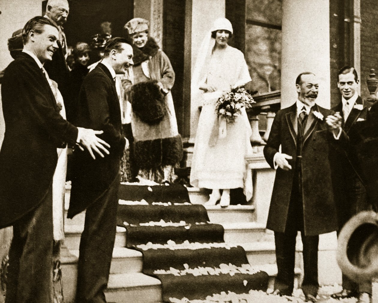 King George Waves Goodbye to Princess Maud, daughter of the Princess Royal as she leaves for her honeymoon with Lord Carnegie, 1923 by English Photographer
