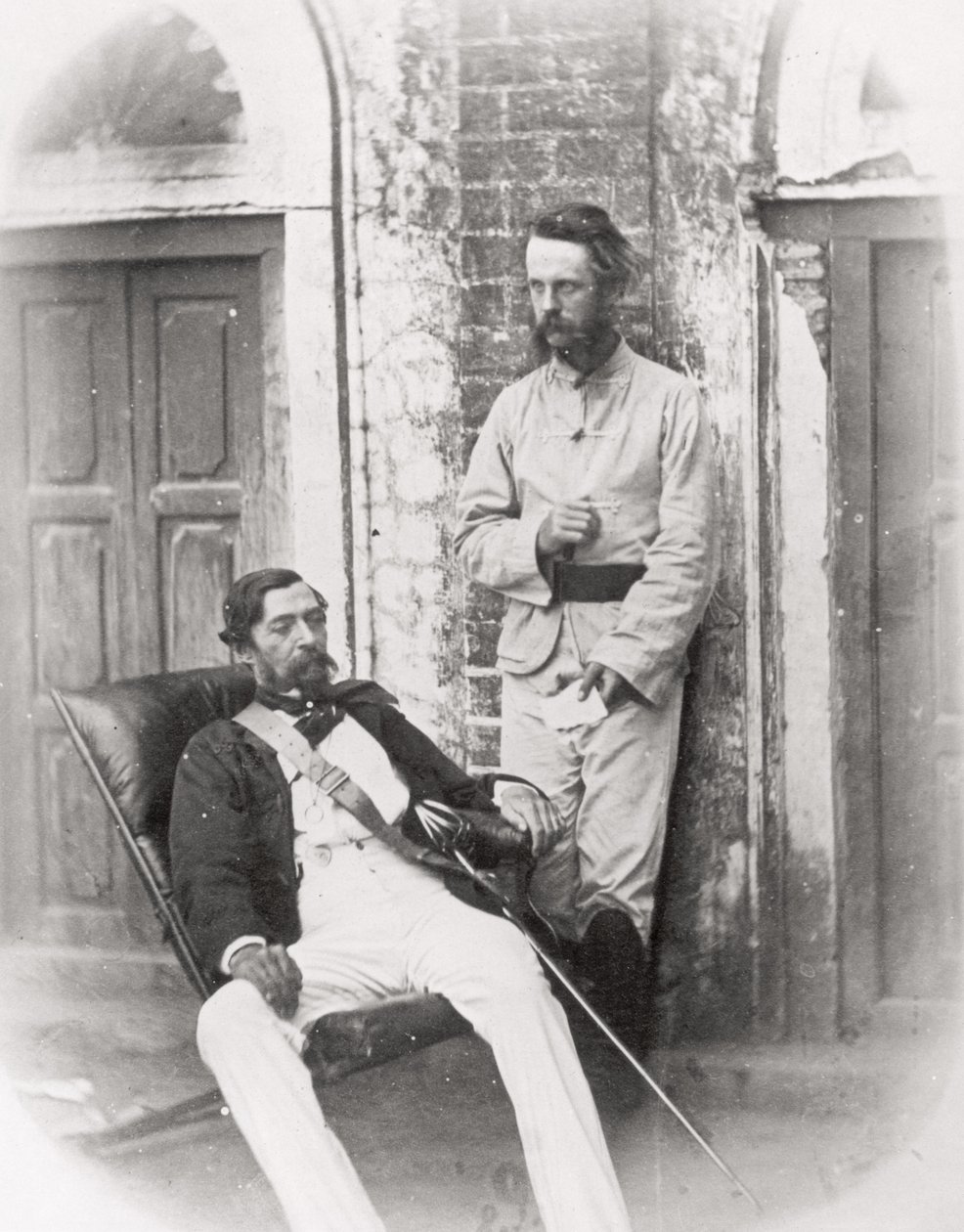 Major-General Sir Robert Napier (seated) and his ADC, Major E.H. Greathead, Lucknow, 1857 by English Photographer