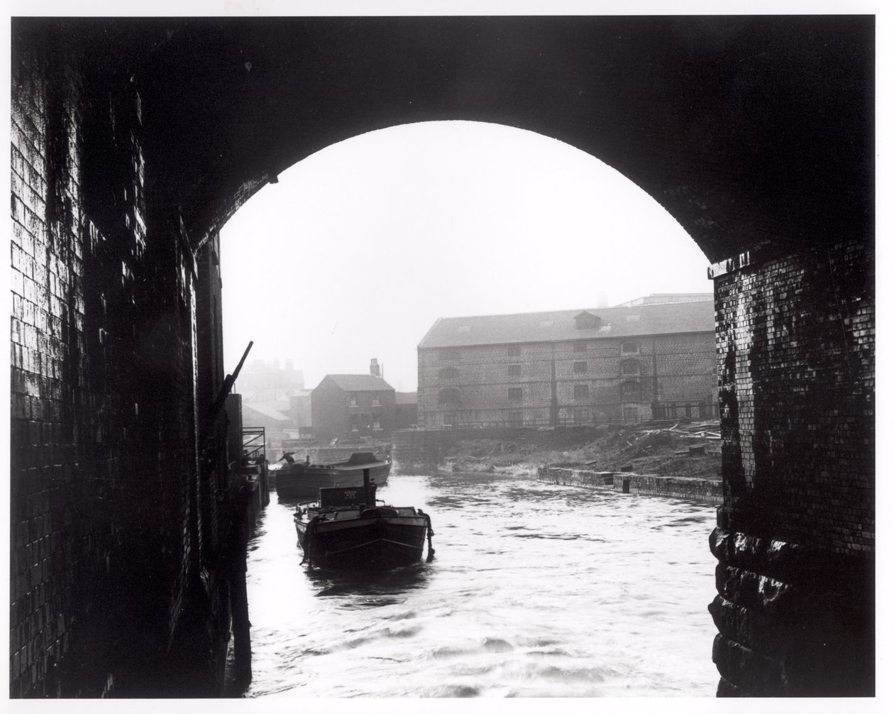 River Aire Viewed from the Dark Arches, Leeds, 1951 by English Photographer