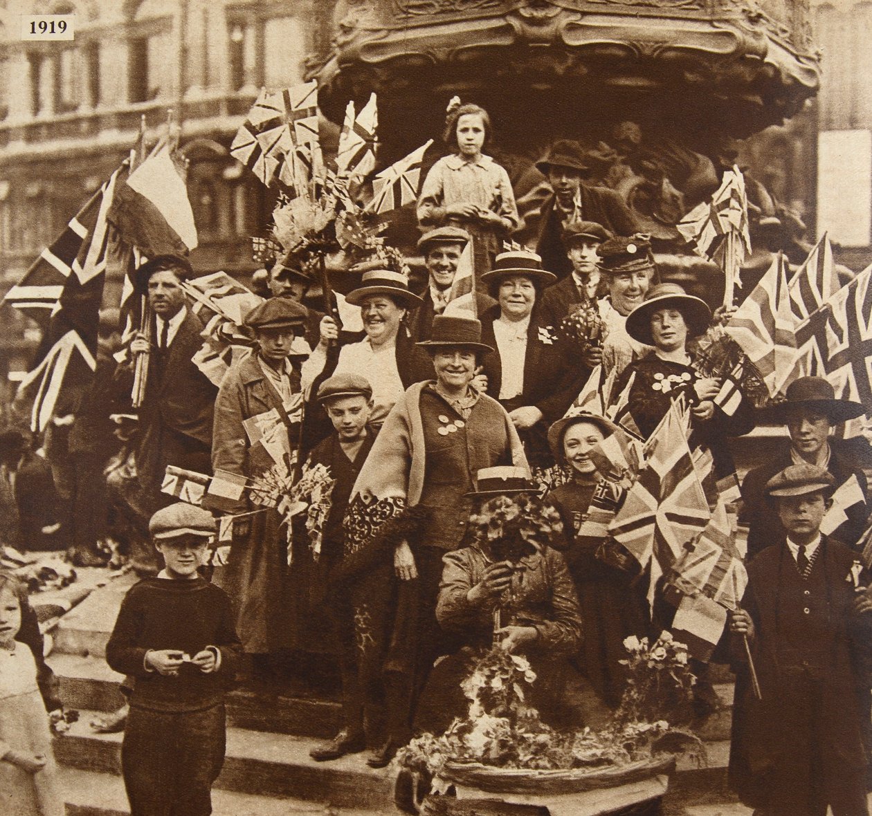 Victory celebrations under Eros, Piccadilly, London, 1919 by English Photographer