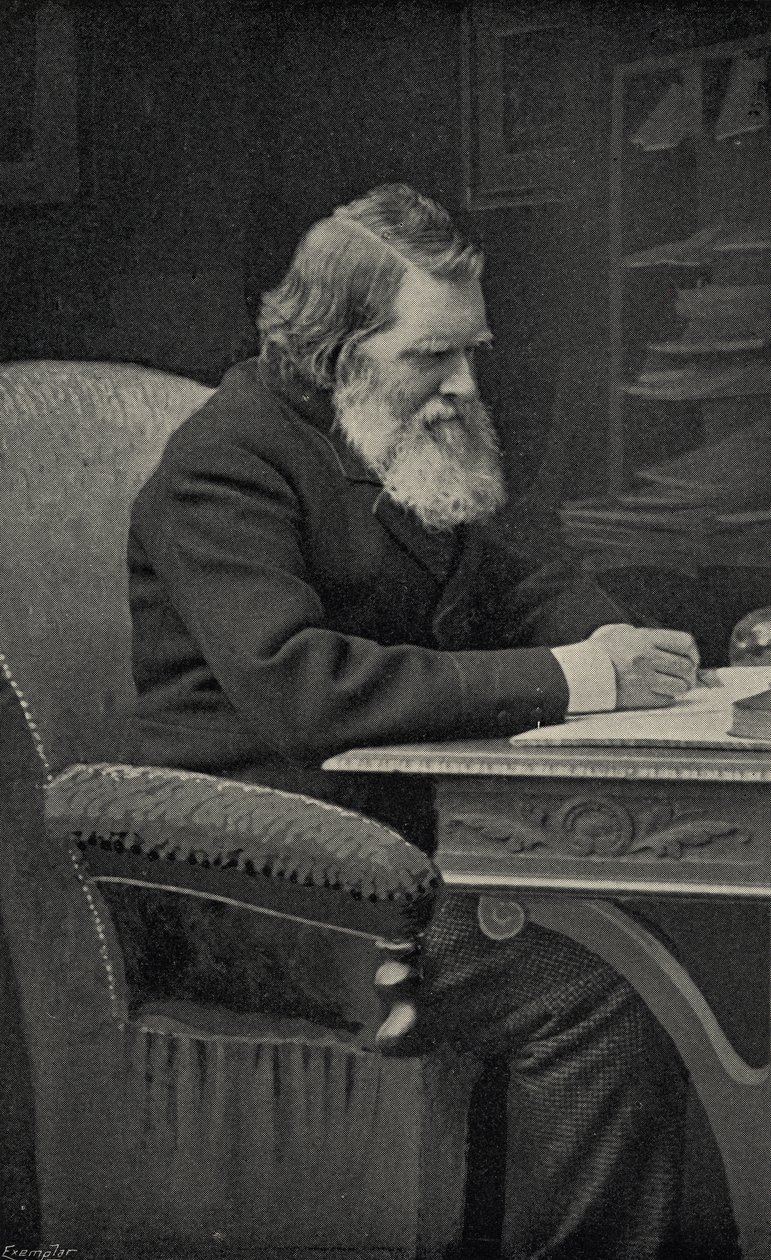 John Ruskin (1819-1900) in his study by English School