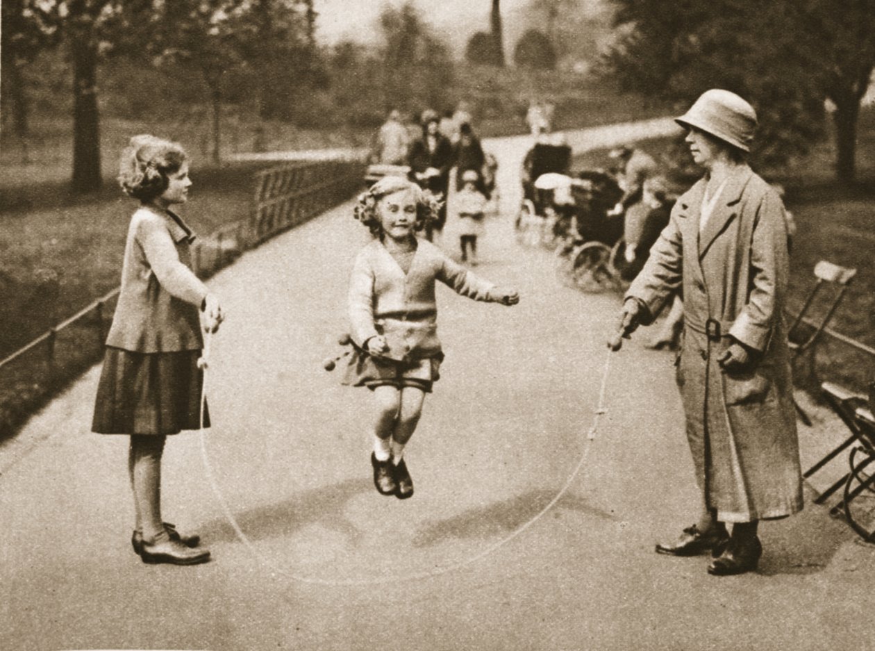 A girl skipping in Hyde Park or Kensington Gardens, from Wonderful London, published 1926-27 by English Photographer