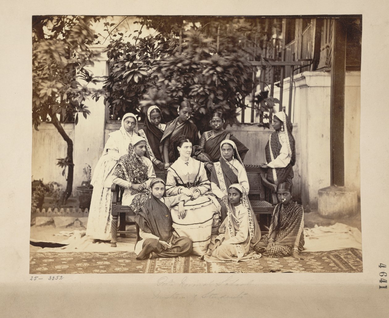 Group of mistress and pupils of the Government Normal School, Bombay by English Photographer