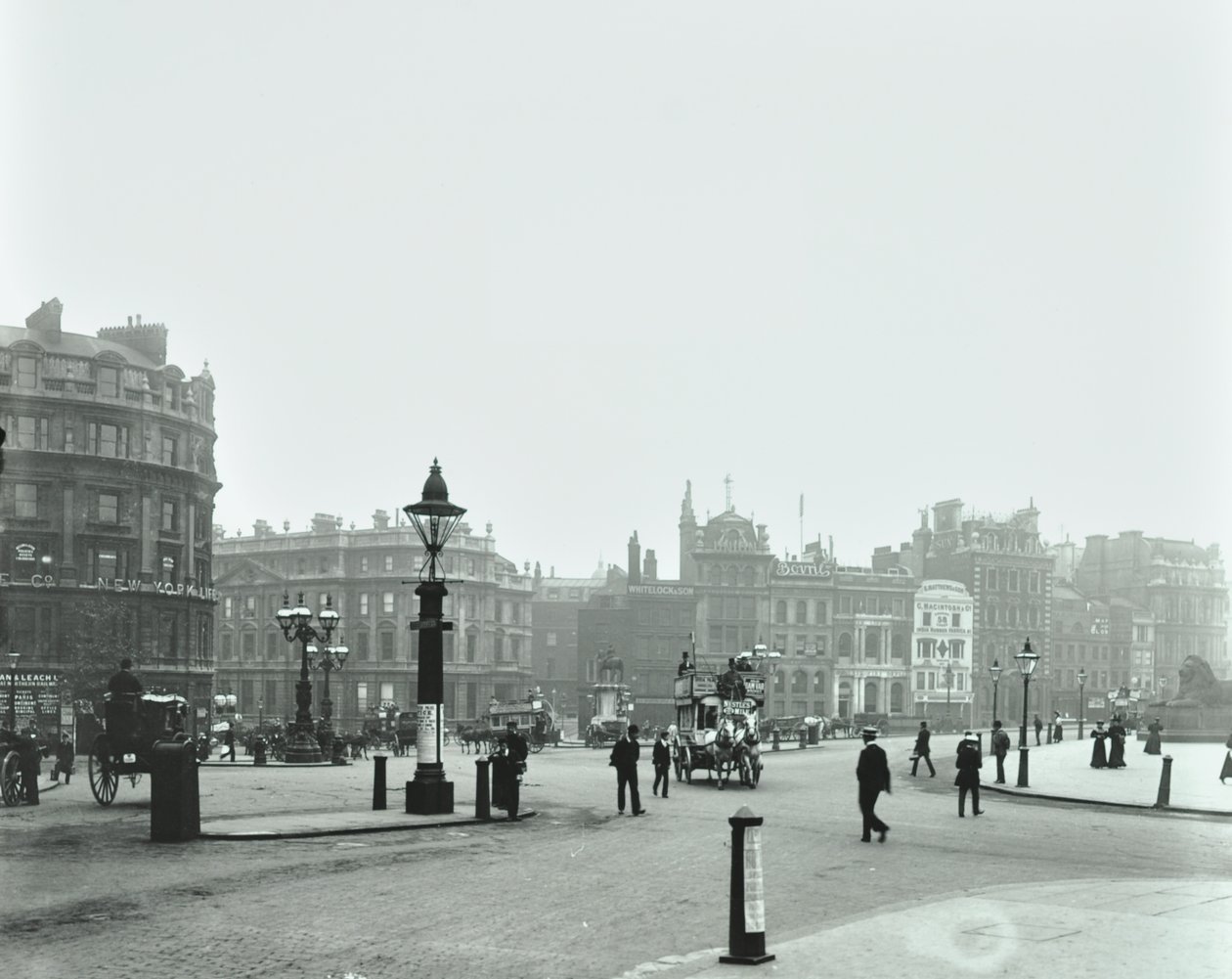 Trafalgar Square, Westminster: Trafalgar Square looking east to Charing Cross, 1896 by English Photographer