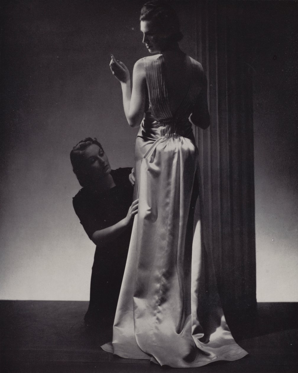 Woman Being Fitted for a Gown by English Photographer
