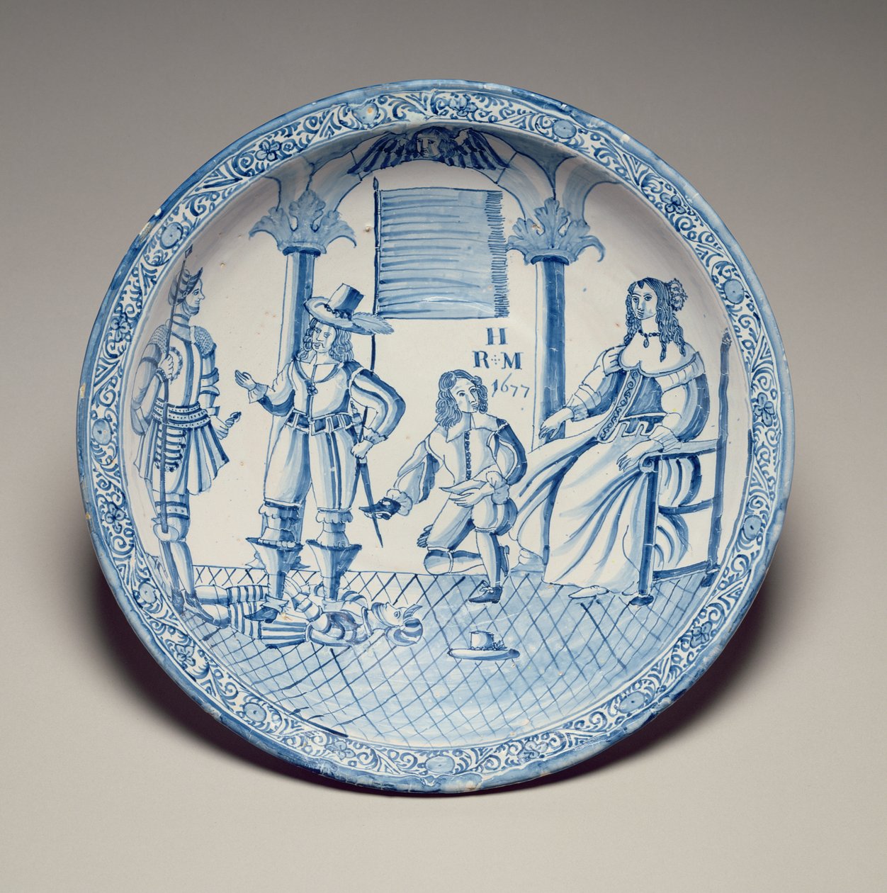 Dish with Queen Catherine seated having a shoe fitted by a kneeling Cavalier by English School
