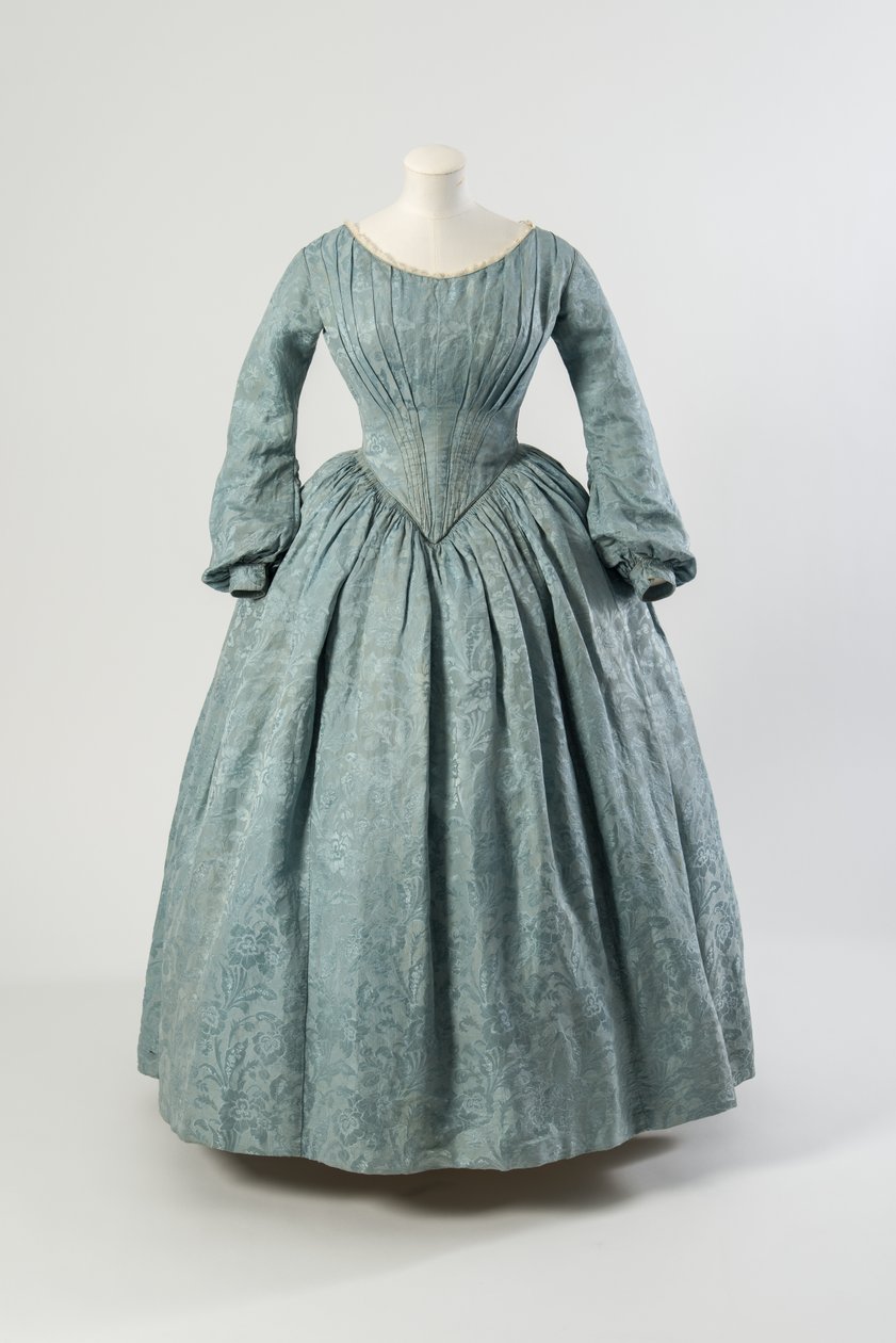 Light blue flowered silk dress with shaped pointed bodice and long full sleeves by English School