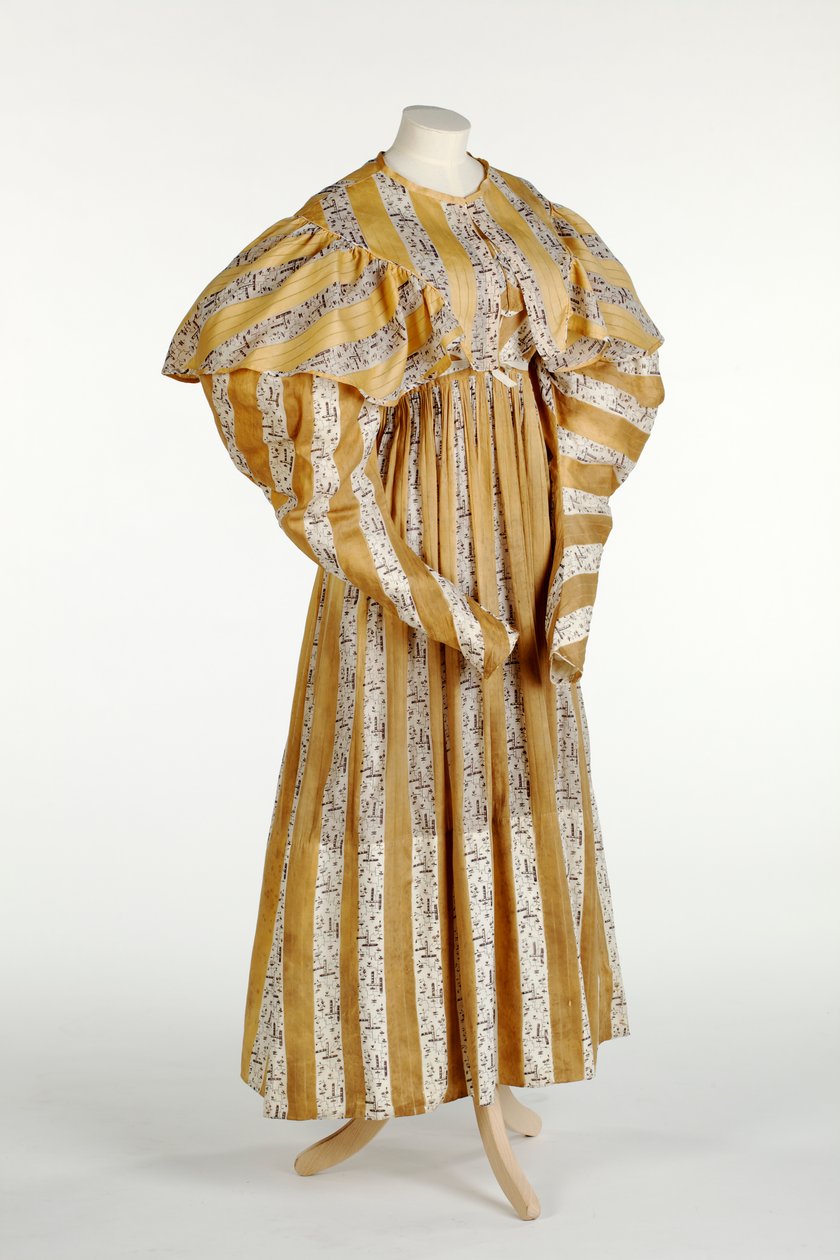 Muslin dress with abstract mauve pattern printed within yellow and white vertical stripe design, c.1820-30 by English School
