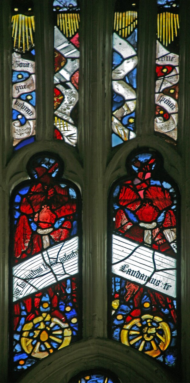 Window depicting angels on wheels with antiphons by English School