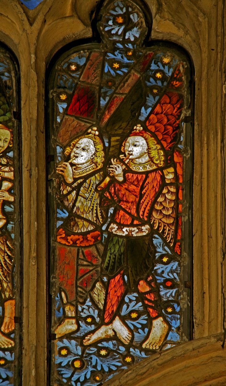 Window depicting musician angels with pipes by English School