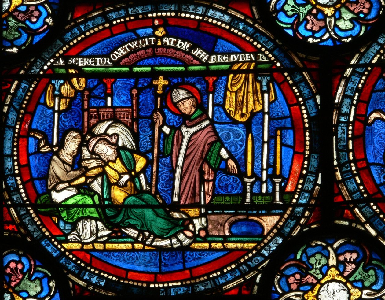 Window n4 depicting a scene from a St Thomas Becket Miracle window: Julia Puintel told to go to the tomb by English School