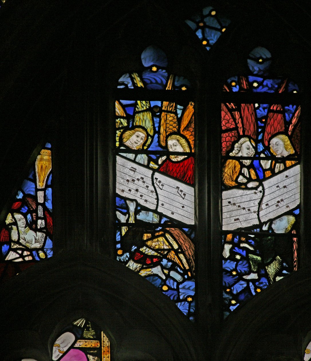 Window depicting the angelic choir singing; angel censing by English School