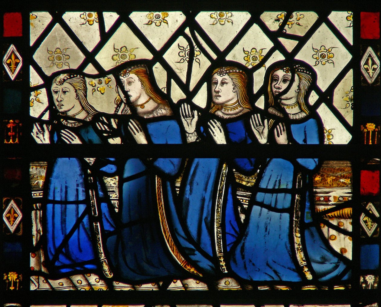 Window W46 depicting a group of female donors by English School