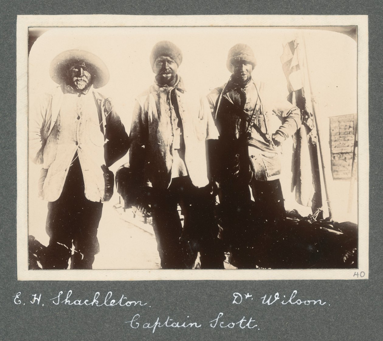 A group photograph of Shackleton, Captain Scott, and Dr Wilson on their return to Discovery from the attempt to reach the South Pole. From album by Sir Ernest Henry Shackleton entitled National Antarctic Expedition (1901-1903) by Ernest Henry Shackleton