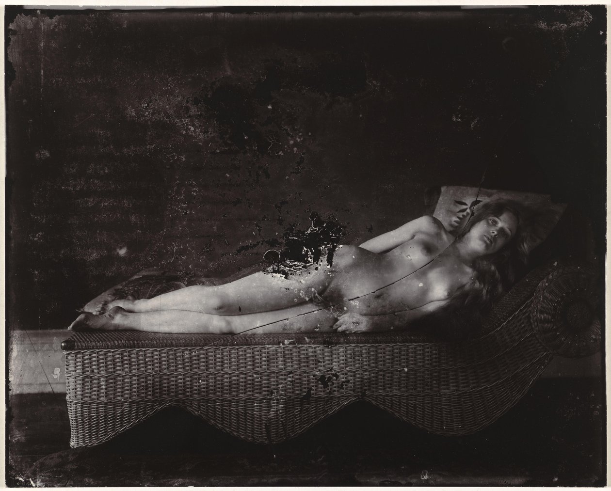 Female Nude on a Chaise Longue by Ernest James Bellocq