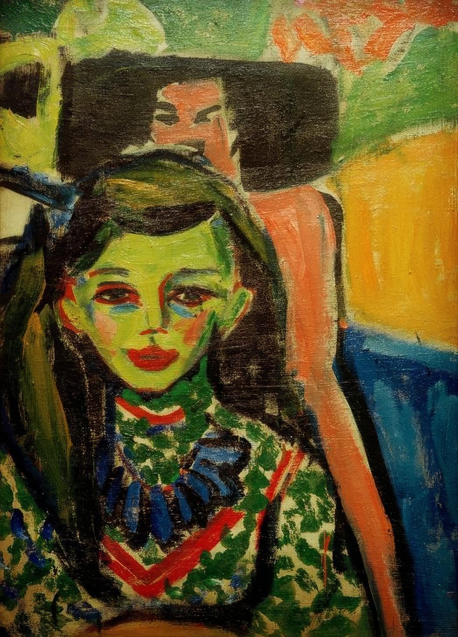 Franzi in front of a carved chair by Ernst Ludwig Kirchner