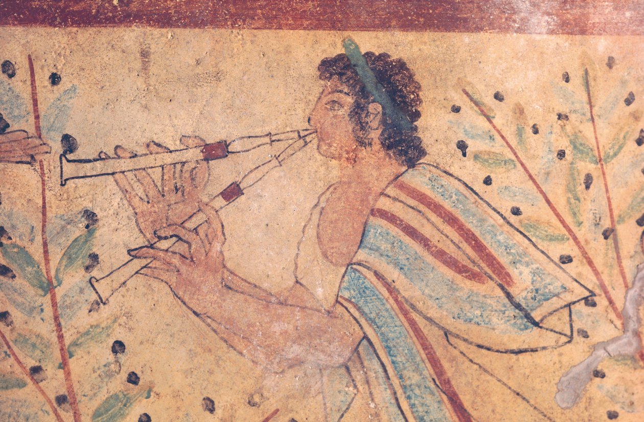 Etruscan art: a flute player (detail) by Etruscan