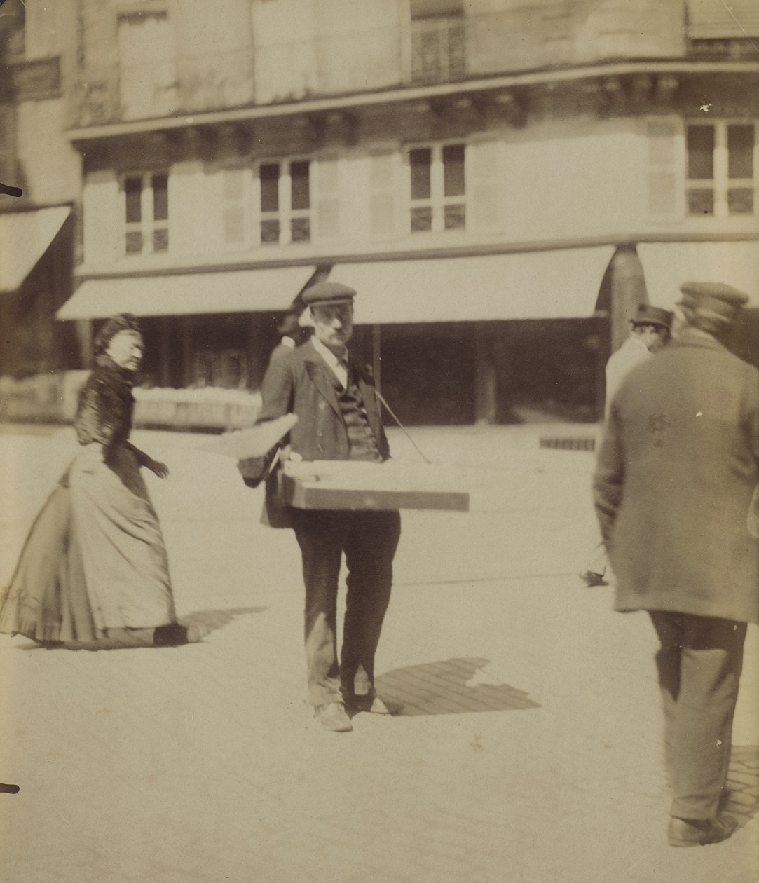 Street Vendor by Eugène Atget