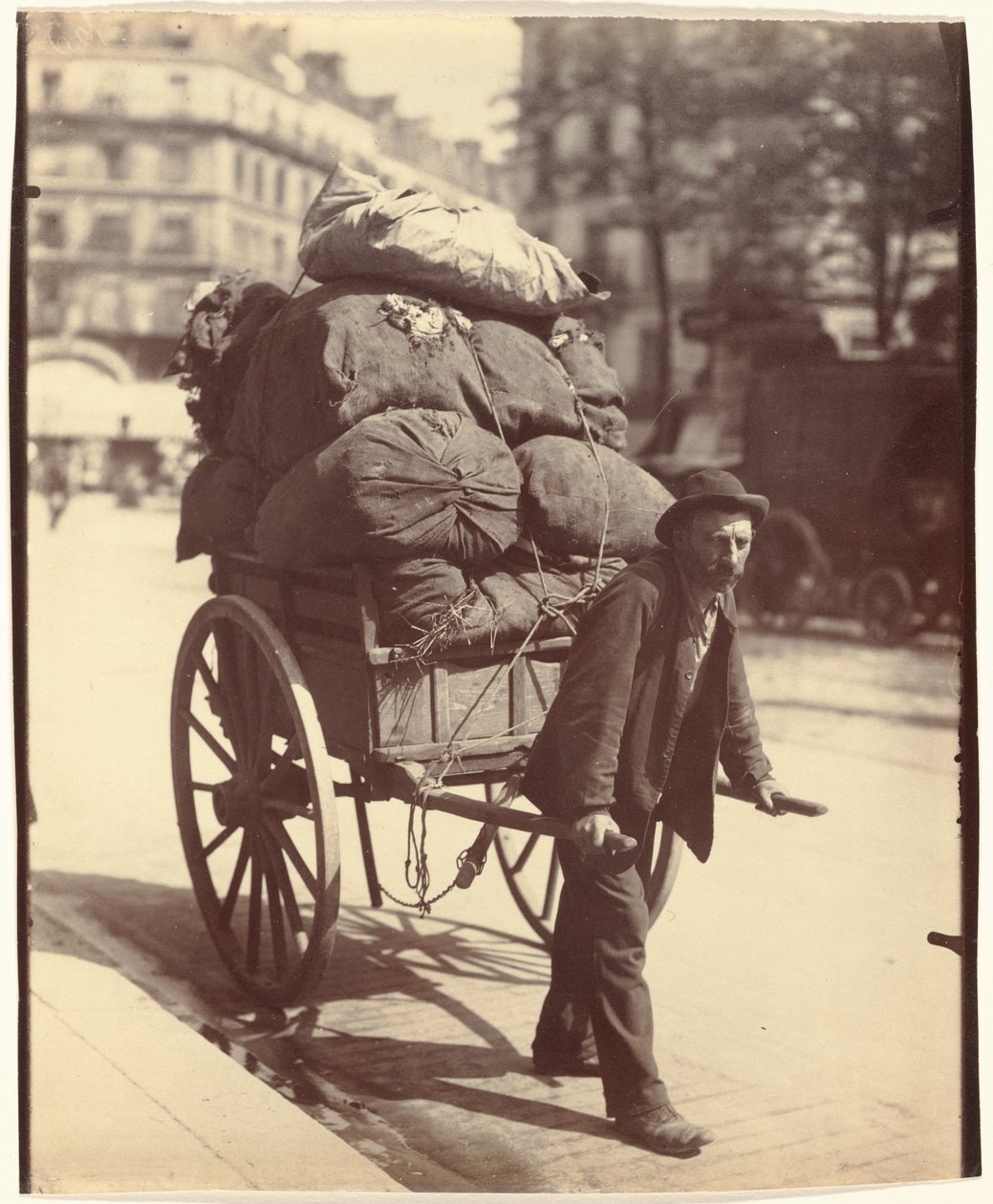 Ragpicker by Eugène Atget