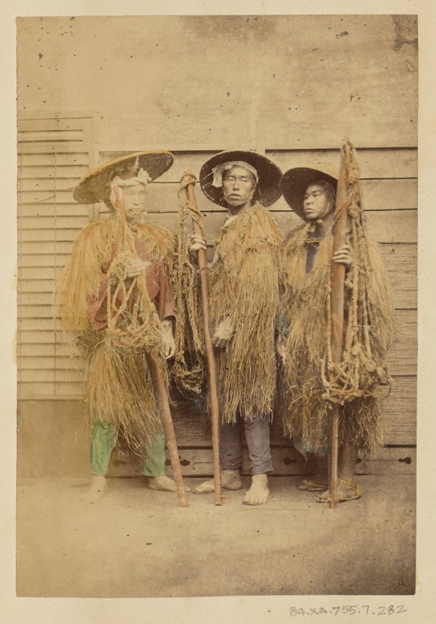 Three Japanese Men in Grass Robes and Wide-Brimmed Hats by Felice Beato