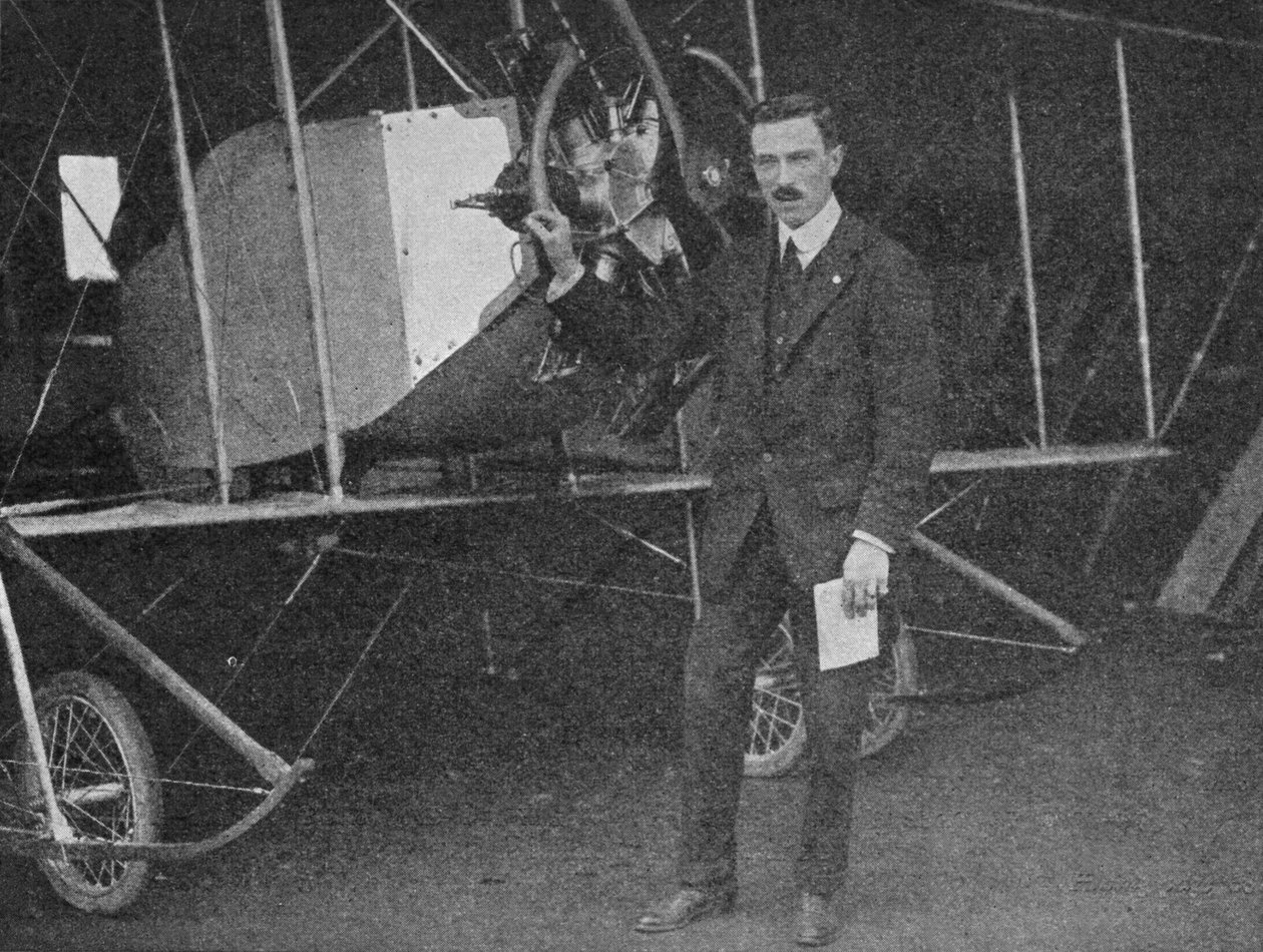 One of the Best Instructors: Lewis W.F. Turner Standing by a Caudron Training Biplane by Flight Photo
