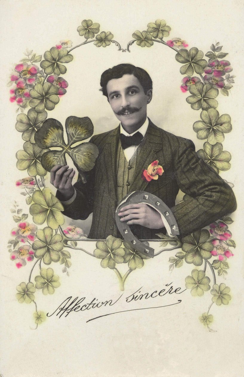 A man with a four-leaf clover and a horseshoe by French School