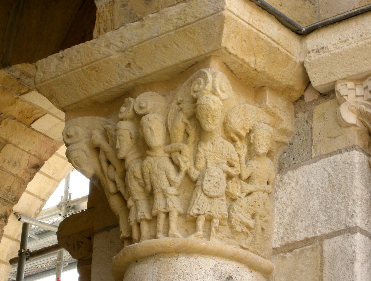 Capital Depicting a Group of Men by French School