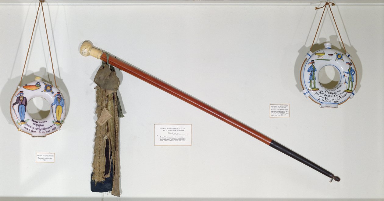 Guild and trade objects, including a walking stick and gourds by French School