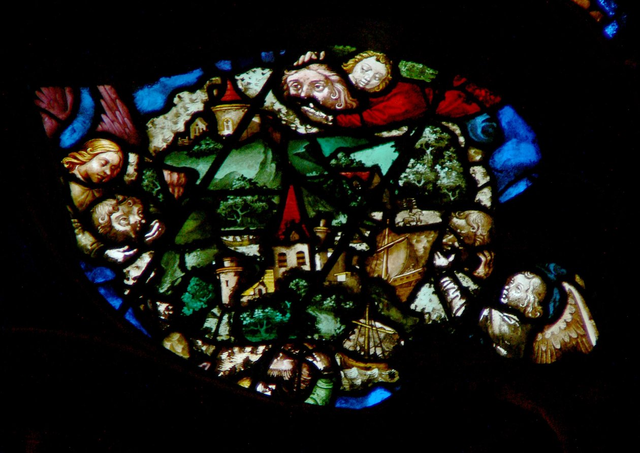 The west rose window depicting a scene from the Book of Revelation: Angels holding back the wind from the land and the ships of the sea by French School
