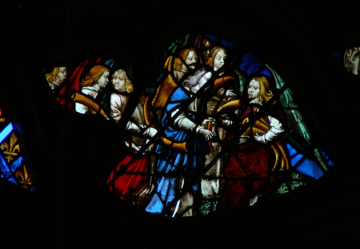 The west rose window depicting a scene from the Book of Revelation: Seven angels before God being given seven trumpets by French School