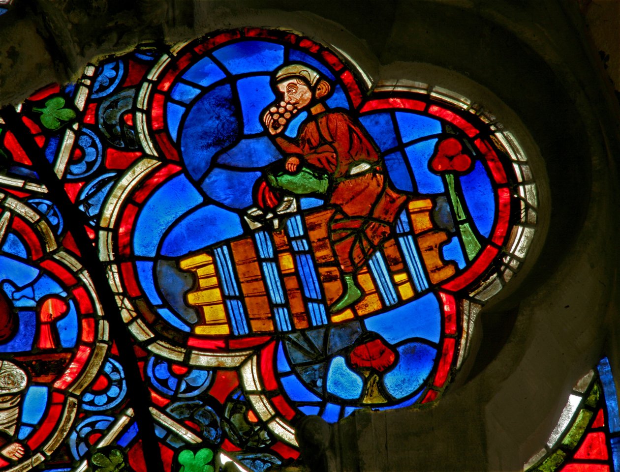 Window depicting the Labours of the Months: October by French School