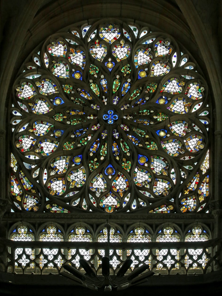 Window S rose depicting the south rose window, built in the early C16, contains much of its original decorative glass, though it was much restored in 1865 by French School