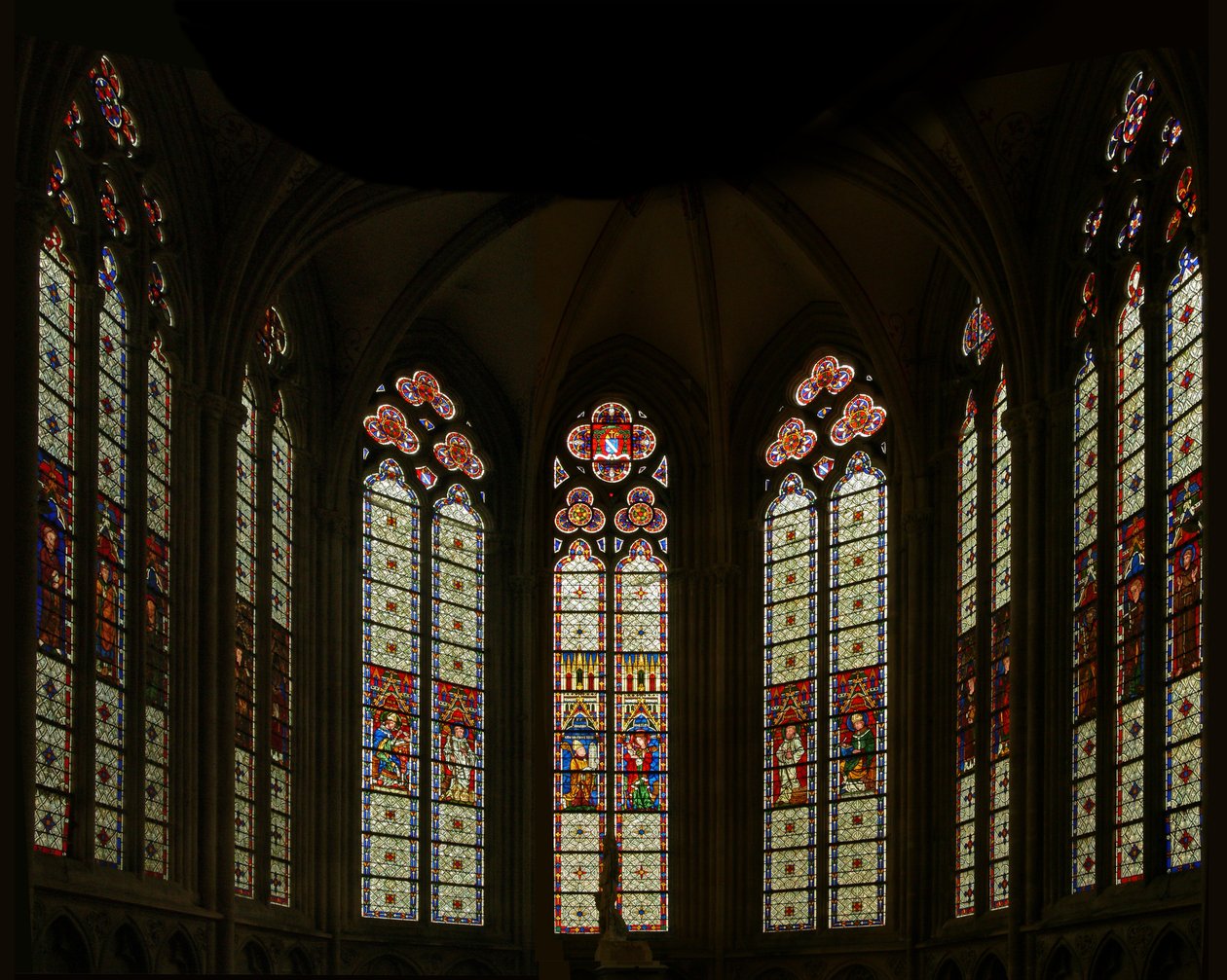 Window depicting a view of east chapel: the central three windows are modern but the others belong to the late thirteenth century by French School