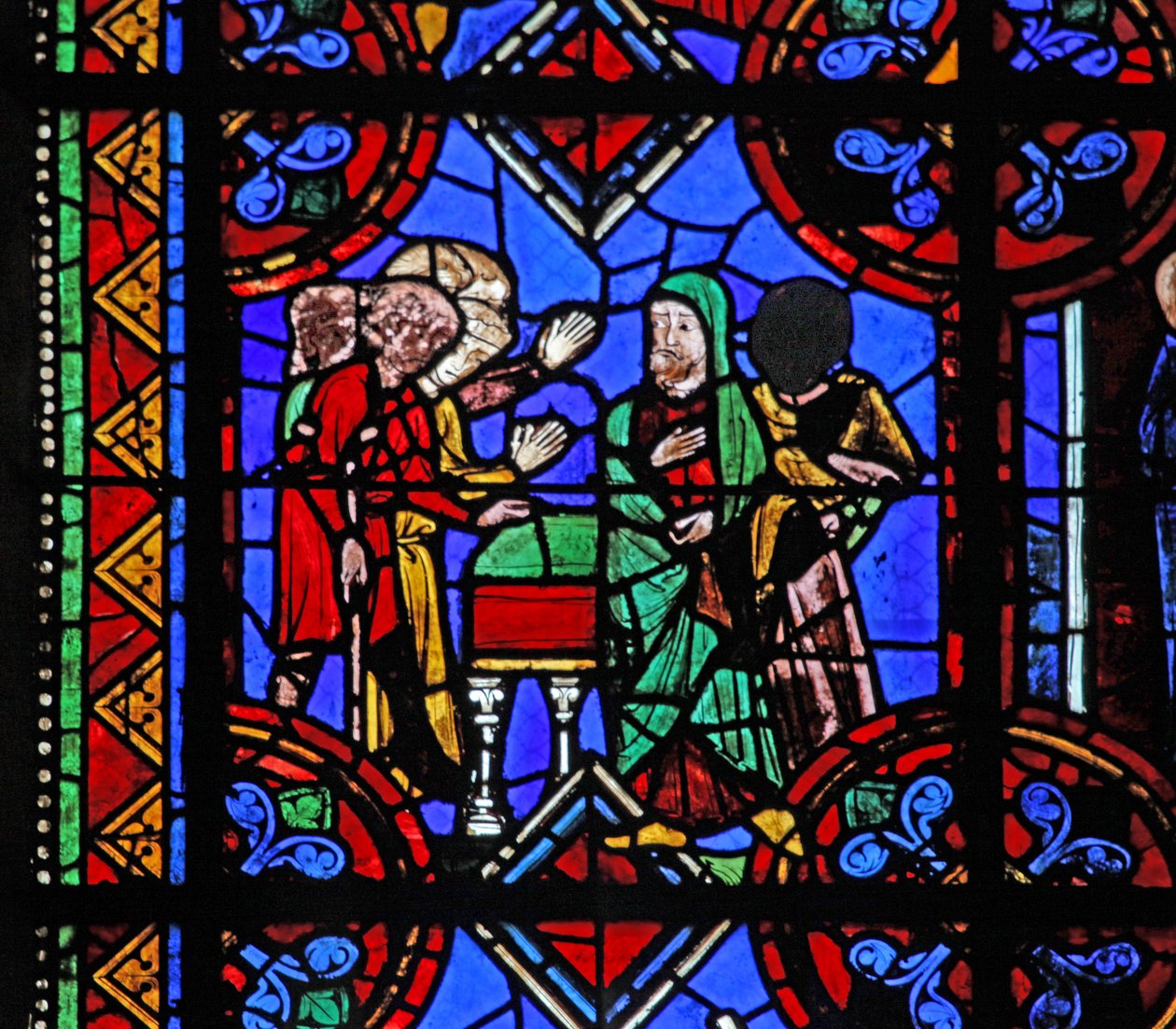 Window depicting pilgrims coming to St Brioude