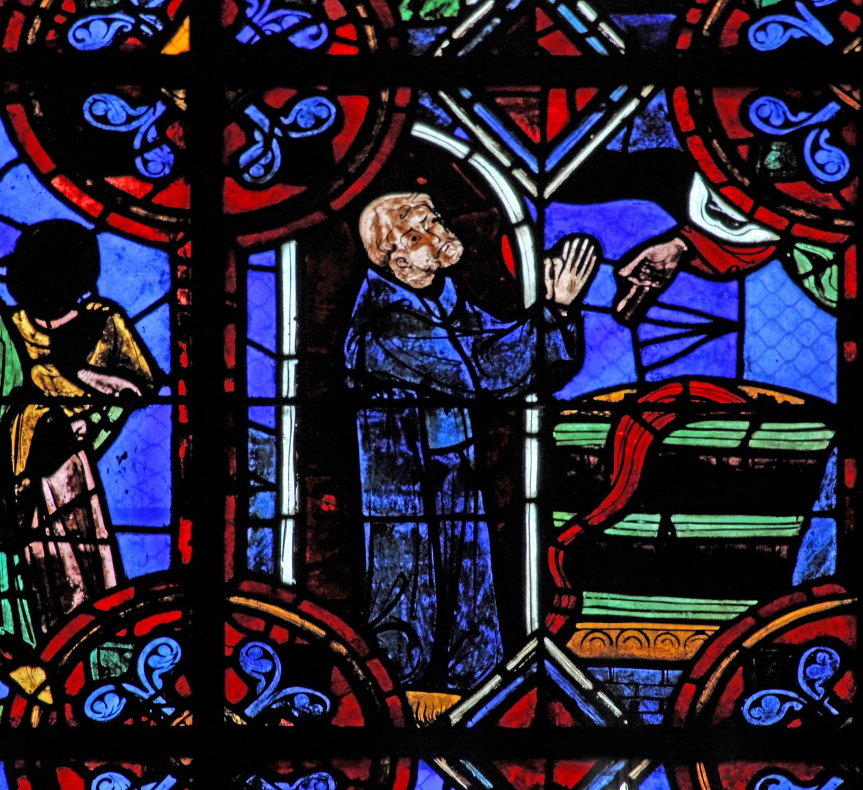 Window depicting the miracle of the full wine barrel at the foundation of St Julien