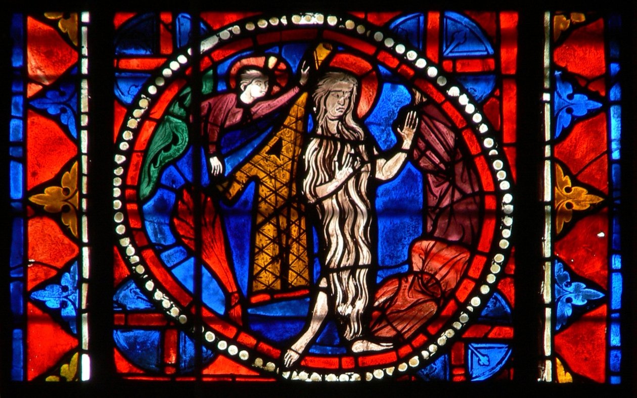 Window depicting St Agnes miraculously protected by her hair by French School