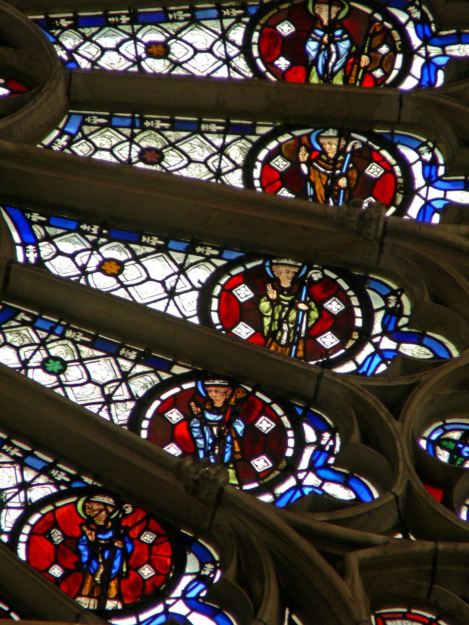 Window w121 depicting bishops, kings, martyrs in a section of the rose window by French School