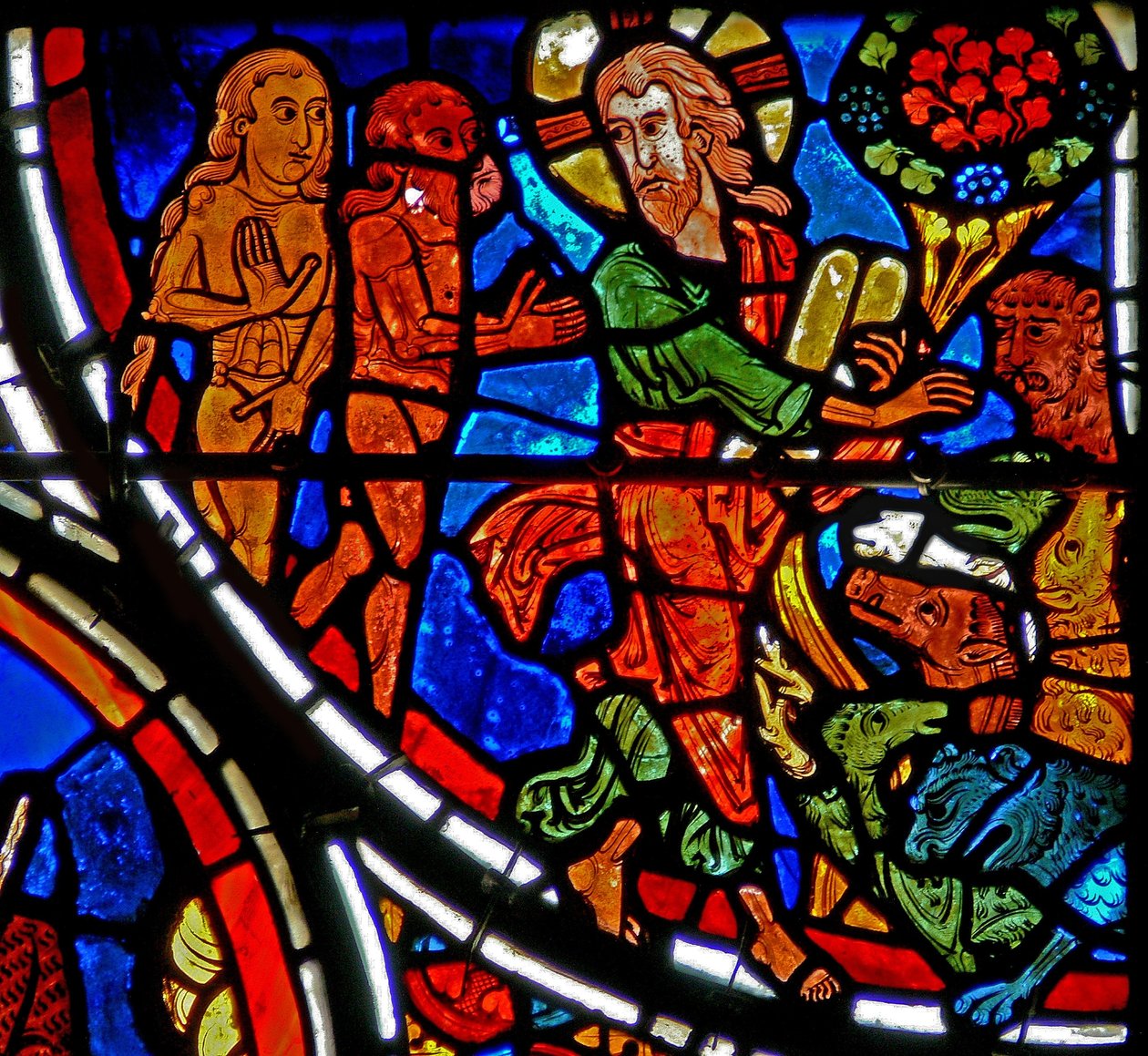 Window depicting Adam and Eve are given dominion over the Earth by French School